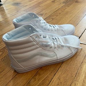 High top white Vans sneakers